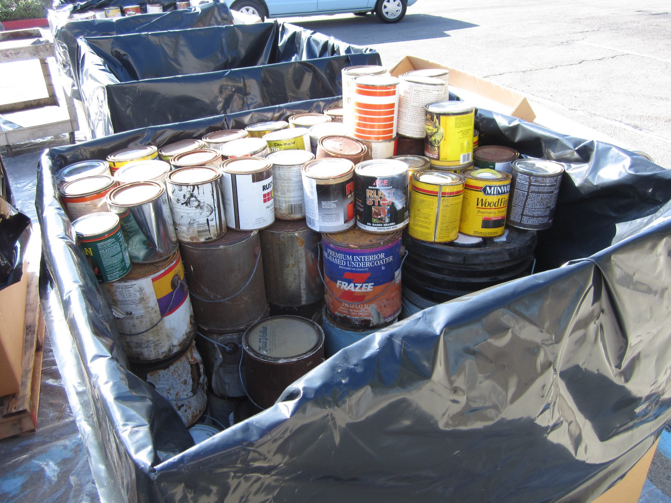 Common HHW items: paint, automotive fluids, fluorescent tubes, cleaning products, batteries and gardening chemicals.